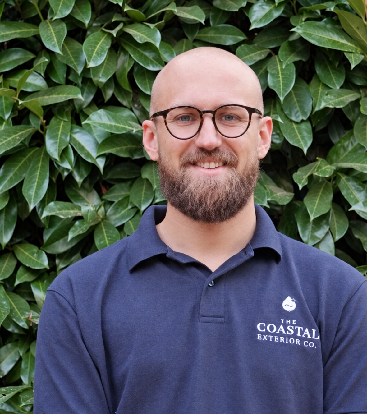 The Coastal Exterior Co. owner in his company uniform